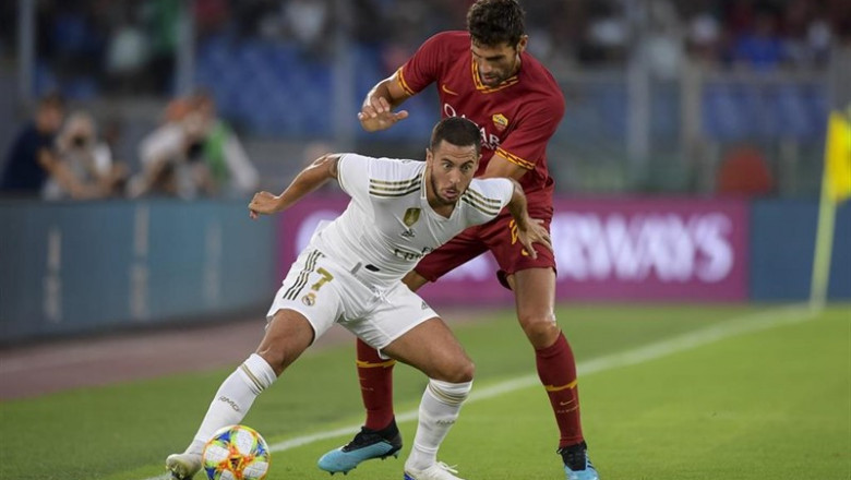 Eden Hazard protege el balón ante Federico Fazio en el amistoso Roma-Real Madrid | Fabio Rossi/Lapresse via ZUMA Pr / DPA ep eden hazard protegebalonfederico fazioamistoso roma-real madrid