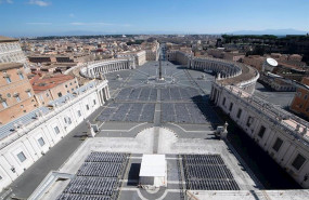ep march 12 2020 - vatican view of st peters square is seen behind a barricade erected at the edge