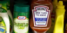 a-heinz-ketchup-bottle-and-a-bottle-of-kraft-parmesan-cheese-are-displayed-in-a-grocery-store-in-new-york