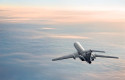 ep archivo   passenger aircraft on the clouds background daybreak flight in stratosphere pastel