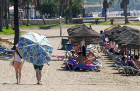 ep archivo   numerosos turistas y malaguenos disfrutan de la playa de la malagueta a 29 de julio de