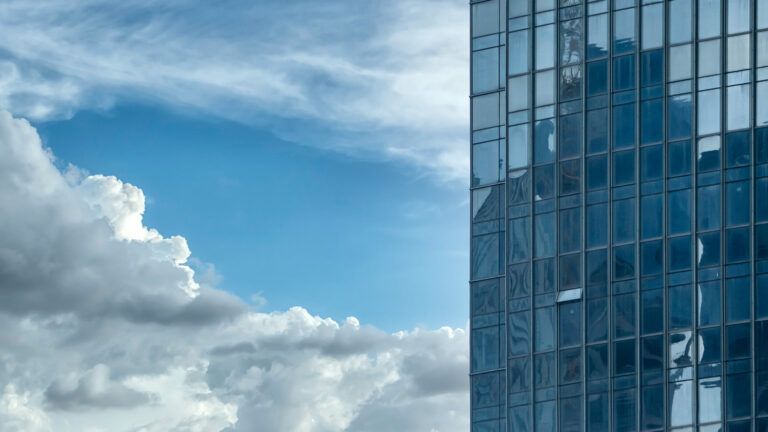 building and clouds banner light 768x432