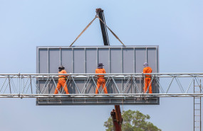 construction workers on billboard catwalk 1