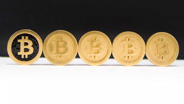 fila monedas bitcoin