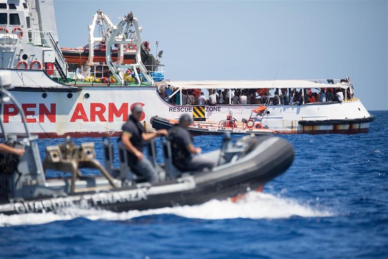 ep handout - 16 august 2019 italy lampedusa a rubber dinghy of the guardia costeria the italian coast guard sails past rescue ship open arms of the aid organisation proactiva open arms photo friedrich bungertseawatchdpa - achtung nur zur redakti