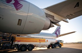 Shell oil tanker and Qatar Airways jet, transport, energy Shell oil tanker and Qatar Airways jet, transport, energy