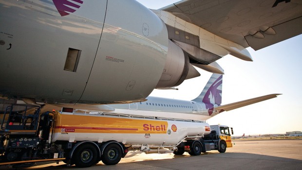 Shell oil tanker and Qatar Airways jet, transport, energy